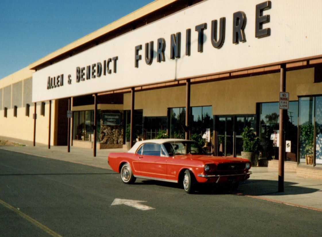 Before the outlets - Allen & Benedict store with red mustang parked out front